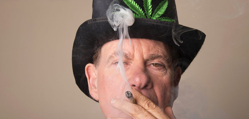 Ed Rosenthal, man smoking joint in top hat with weed leaf