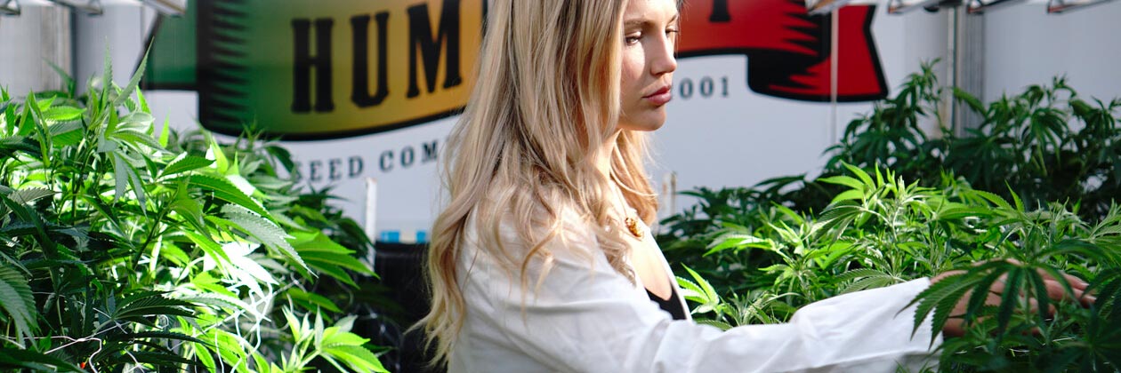 Halle Pennington smelling cannabis plants