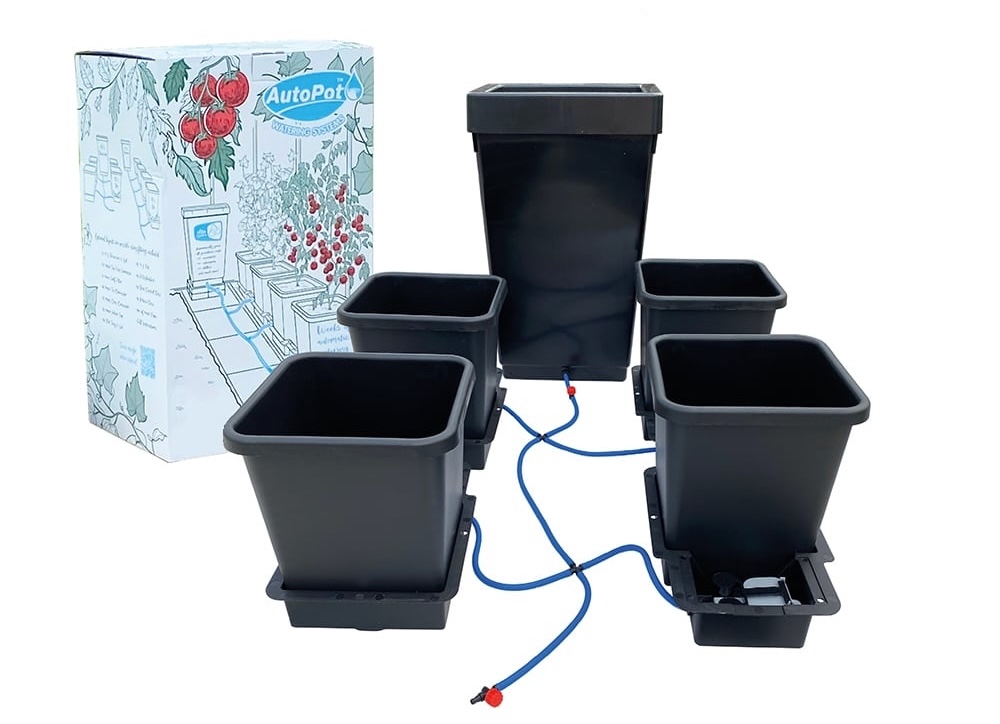 4pot automated watering system with black pots, connecting tubes, reservoir, and box