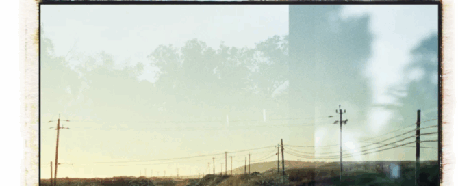 Grass Valley road through the green hills shot on film