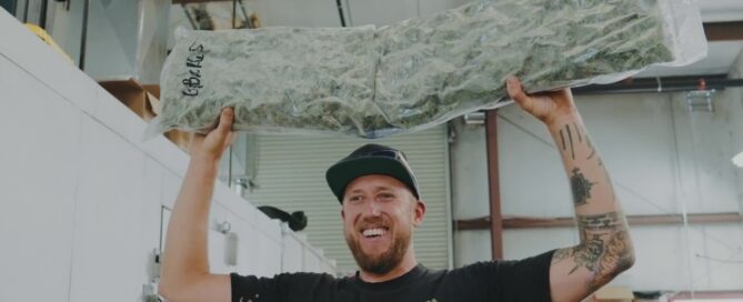 ben lind with giant bag of frozen cannabis for bubble hash